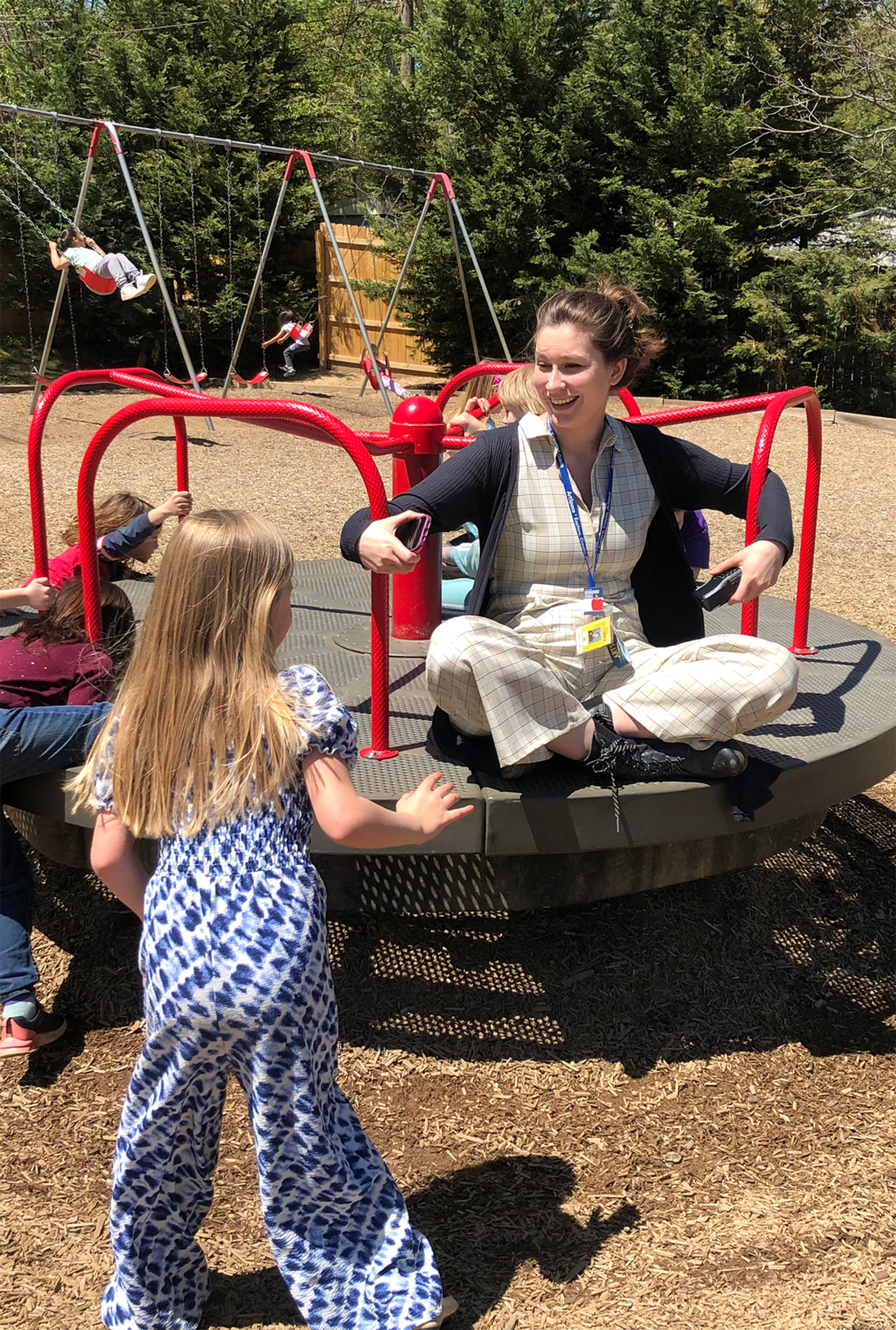 On the playground with students.